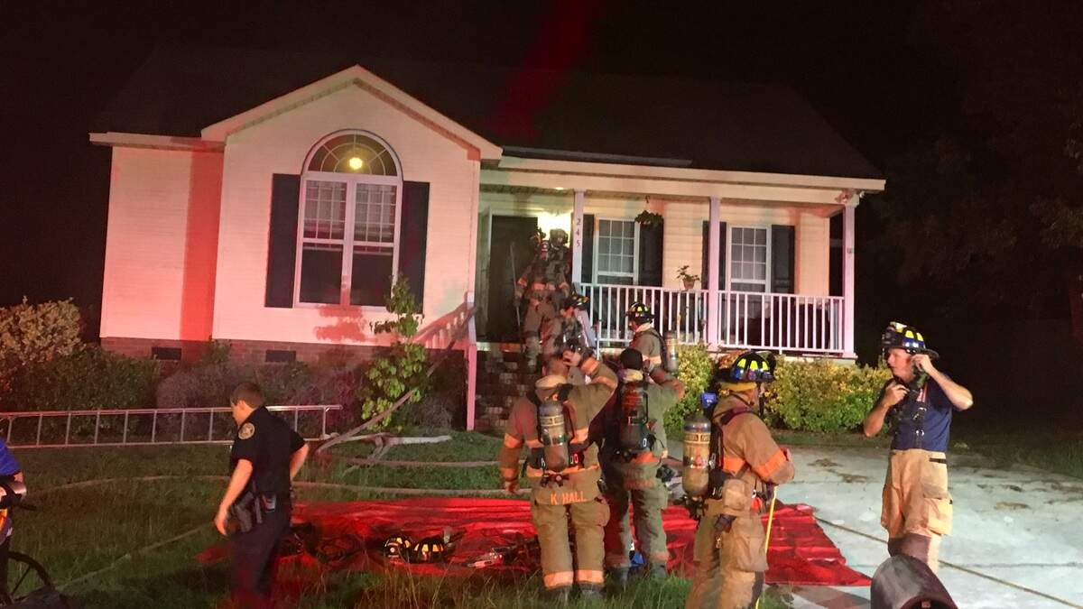 Firefighters respond to a house fire at the 200 block of Colony Lakes Drive Aug. 20, 2018.