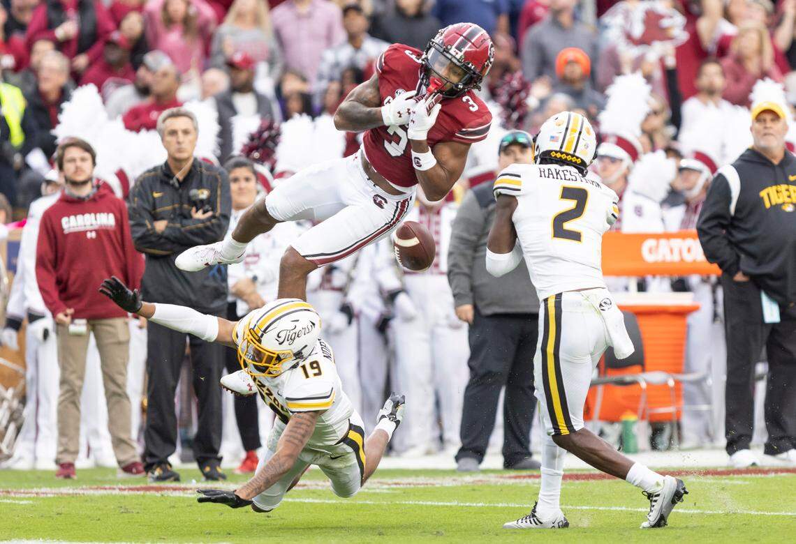 South Carolina Gamecocks wide receiver Antwane Wells Jr. (3) gets upended by Missouri Tigers defensive back Dreyden Norwood (19) as he goes up for a pass at Williams-Brice Stadium in Columbia, SC on Saturday, Oct. 29, 2022.