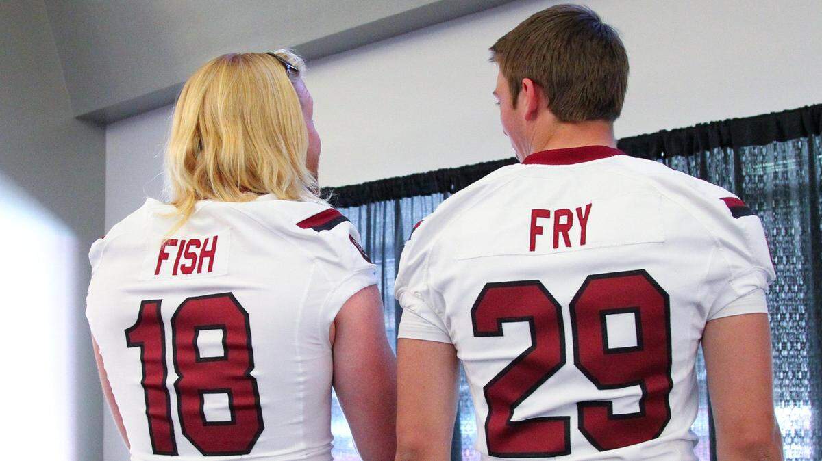 File photo: Patrick Fish and Elliott Fry pose for photographs during a Steve Spurrier Ladies Football Clinic.