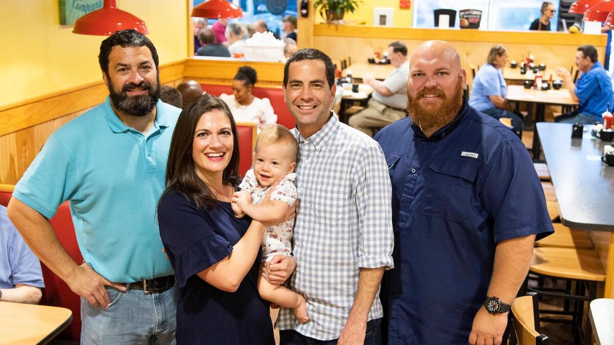 Steve Perry, owner of the Eggs Up Grill in Irmo, Jayne Koehler, Gabriel Koehler, 10 months, Jon Koehler and Major Hillard at the Eggs Up Grill where Hillard saved Gabriel’s life on Thursday, September 23, 2021. Hillard does not have a medical background, but has experience with saving his own children from choking.