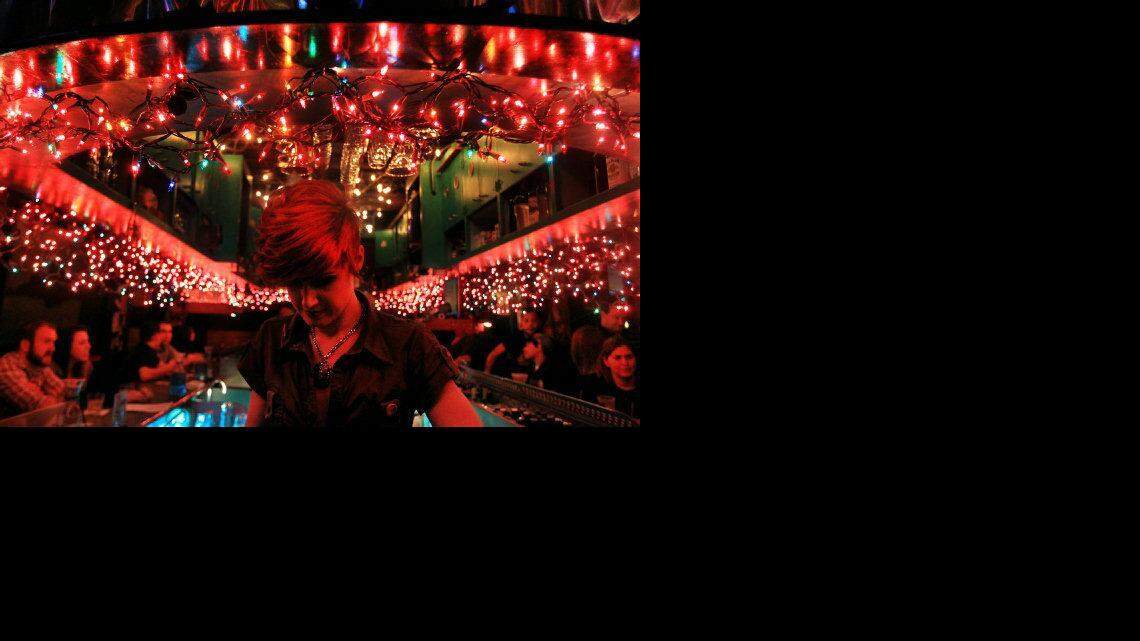 A bartender mixes drinks at The Art Bar in the Vista.