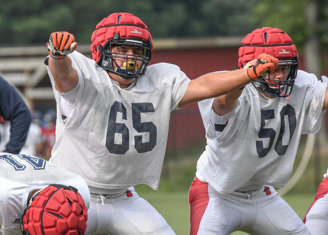 Belton-Honea Path High School senior offensive lineman Jackson Hall, left, and Jace Rentz practice in Honea Path, S.C. Wednesday, August 4, 2021.