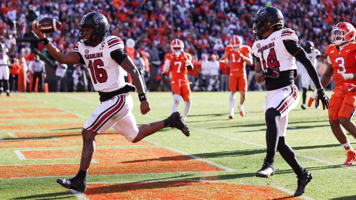 South Carolina quarterback LaNorris Sellers (16) carries the ball in for the game-winning touchdown during the second half of the Palmetto Bowl between South Carolina and Clemson at Memorial Stadium in Clemson on Saturday, November 30, 2024.