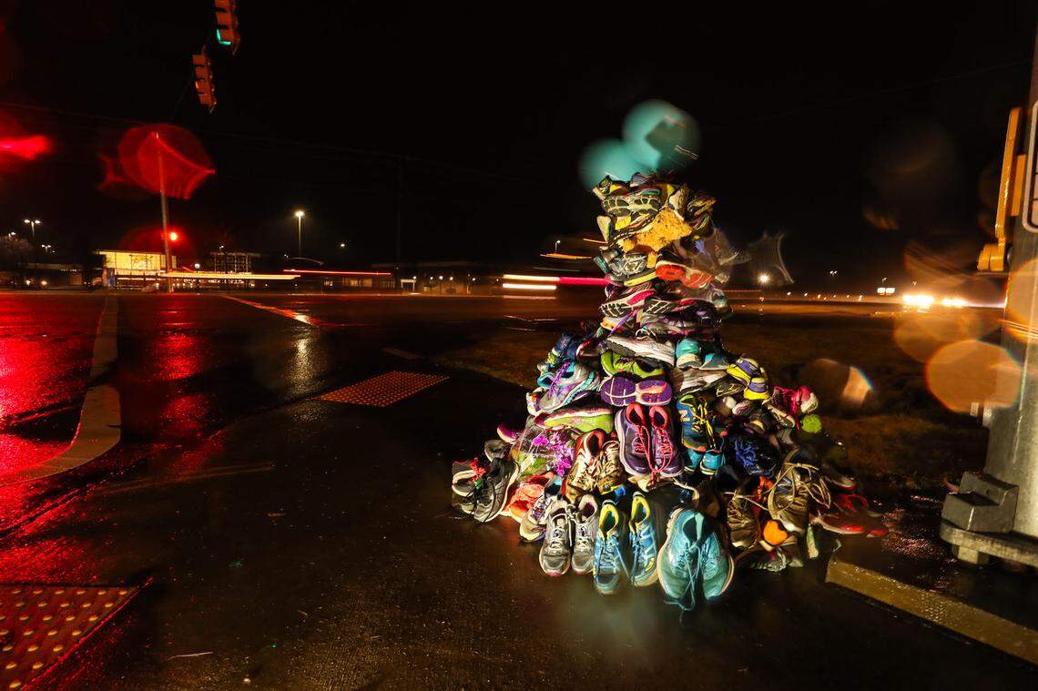 Over 100 runners gathered near Lexington High School to join in a prayer circle for Dianne Sullivan Wells, 36, who was crossing U.S. 1 near Lexington High School around 5 a.m. Tuesday when she was fatally struck by a truck. They also brought ‘retired’ running shoes and made a memorial tree on the side of the road. 12/20/18