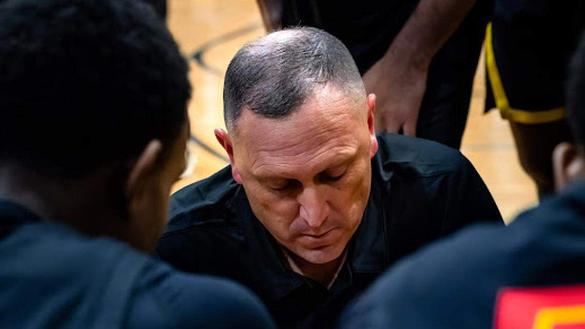 Oak Hill basketball coach Yerrick Stoneman diagrams a play during Thursday’s game against Ridge View at 2022 Bash high school showcase.