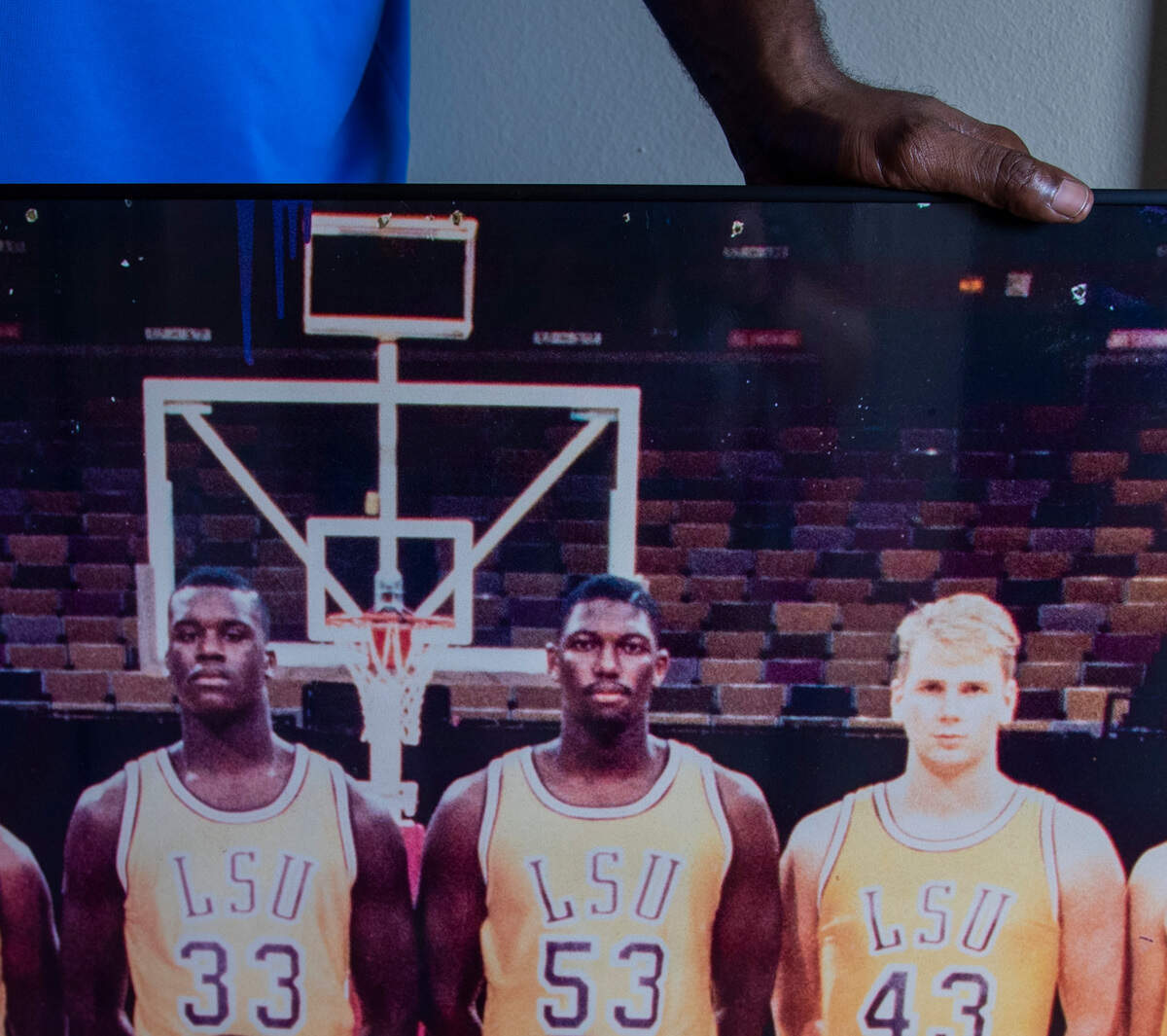 Stanley Roberts keeps a large poster of the 1989-90 LSU basketball team in his Baton Rouge home. It shows Roberts (53) and his friend Shaquille O’Neal. 8/17/22