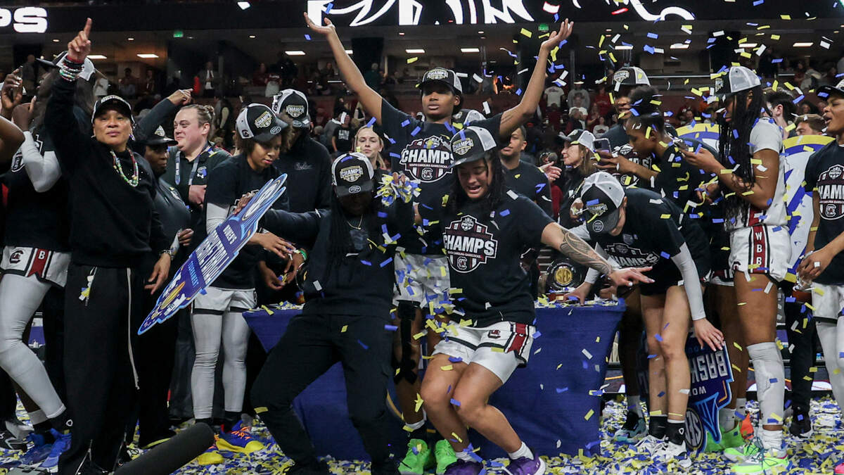 The Gamecocks celebrate winning the SEC Tournament at the Bon Secours Wellness Arena in Greenville on Sunday, March 9, 2025. The University of South Carolina beat Texas, 64-45 to claim their 9th SEC Championship win.