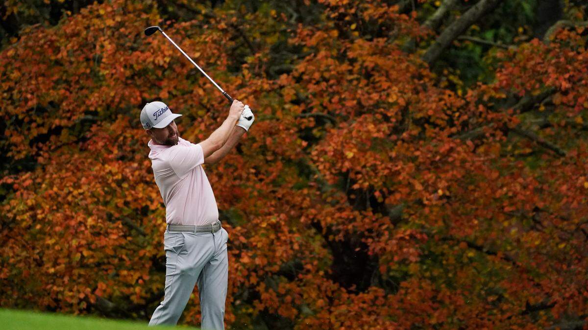 Webb Simpson hits on the second fairway during a practice round for the Masters golf tournament Tuesday, Nov. 10, 2020, in Augusta, Ga. (AP Photo/Charlie Riedel)