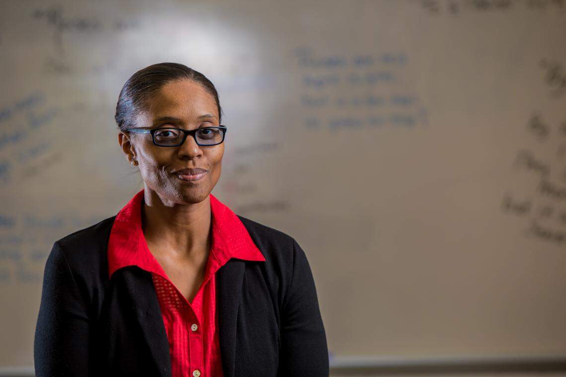 Low pay is one reason Charlene Sales-McMillan, an English teacher in a Columbia area high school, is considering leaving the profession.