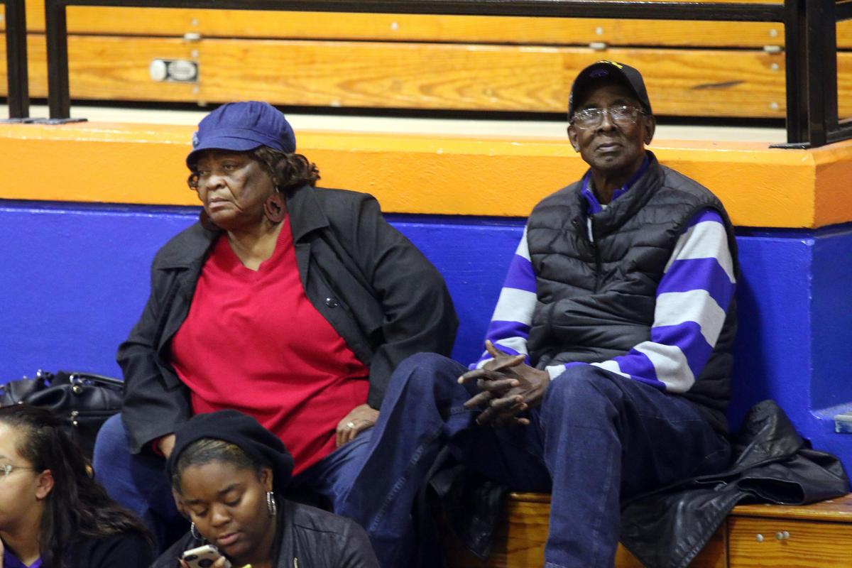 Julia and Stephen English look on during the Tuesday, Nov. 27 Richland Northeast basketball game, where their son Jo Jo is the head coach.