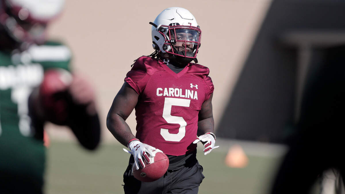 Gamecock wide receiver Dakereon Joyner (5) carries the ball during practice in Columbia on Tuesday, March 14, 2023.
