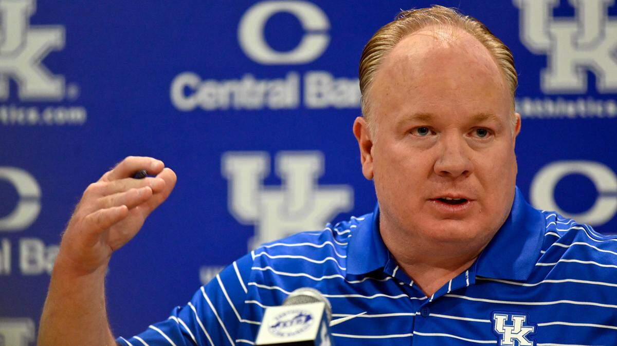 Kentucky coach Mark Stoops answers questions during the NCAA college football team’s media day in Lexington, Ky., Wednesday, Aug. 3, 2022.