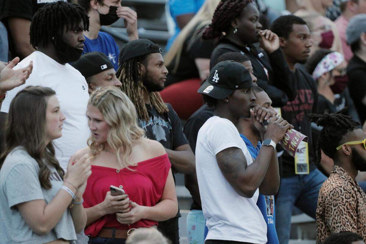 Fans in the student section watch Erskine College plays Shorter University on Saturday, March 13, 2021.