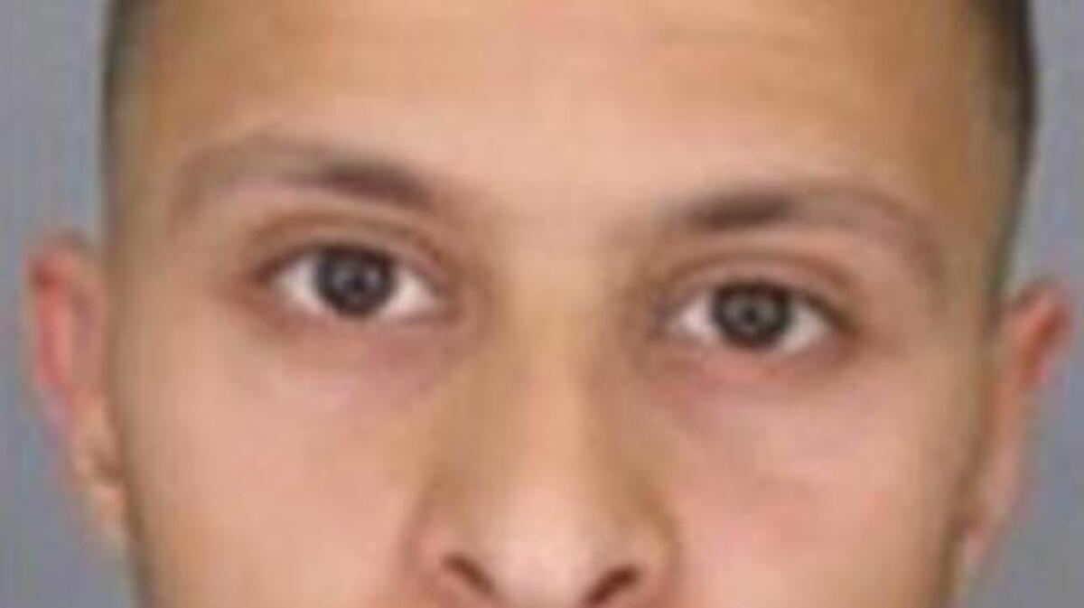 This undated file photo provided by French Police shows 26-year old Salah Abdeslam, who is wanted by police in connection with recent terror attacks in Paris, as police investigations continue Friday, Nov. 13, 2015. French police released the wanted notice and photo of the suspect on the run since the attacks in Paris on Friday. The notice, released on the France National Police Twitter account, says anyone seeing Salah Abdeslam, should consider him dangerous. (Police Nationale via AP)