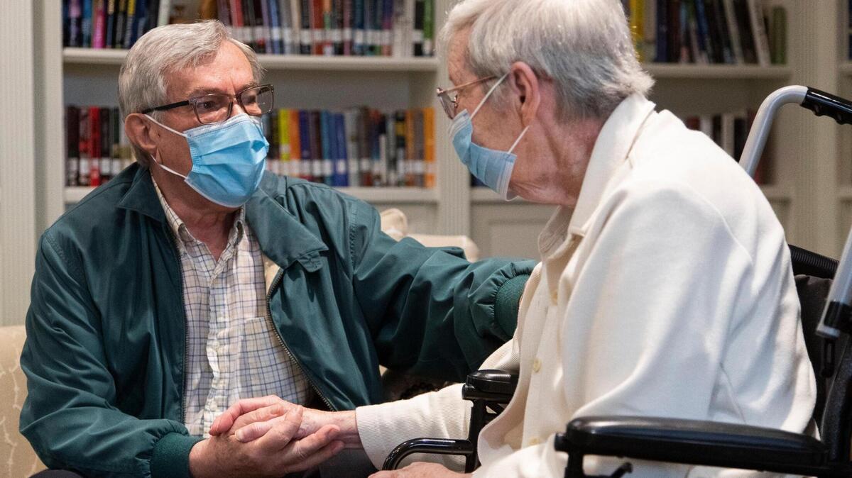 Ulrich Shaffer and Nora Schaffer pose for a portrait at his home in Lexington, South Carolina on Thursday, February 11, 2021. The Shaffers have both received the coronavirus vaccine, but restrictions meant to slow the spread of the coronavirus make it difficult for Nora to see their adult son.