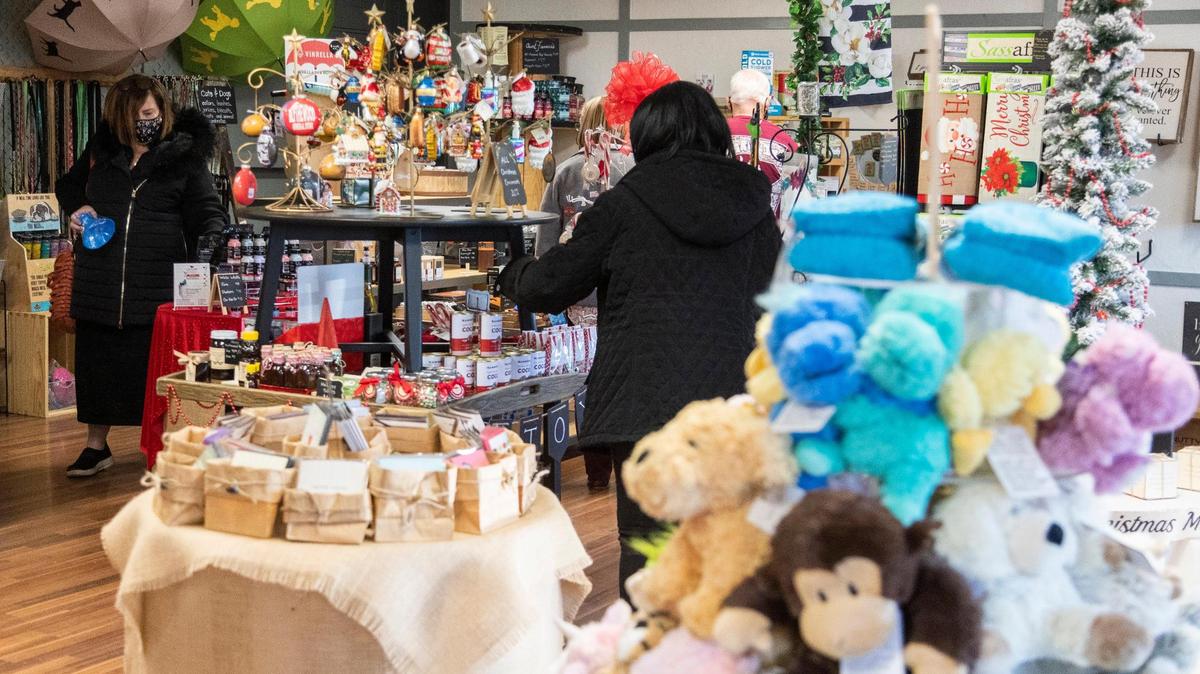 Shoppers look for gifts at the Blythewood General Store on Tuessday, December 8, 2020.