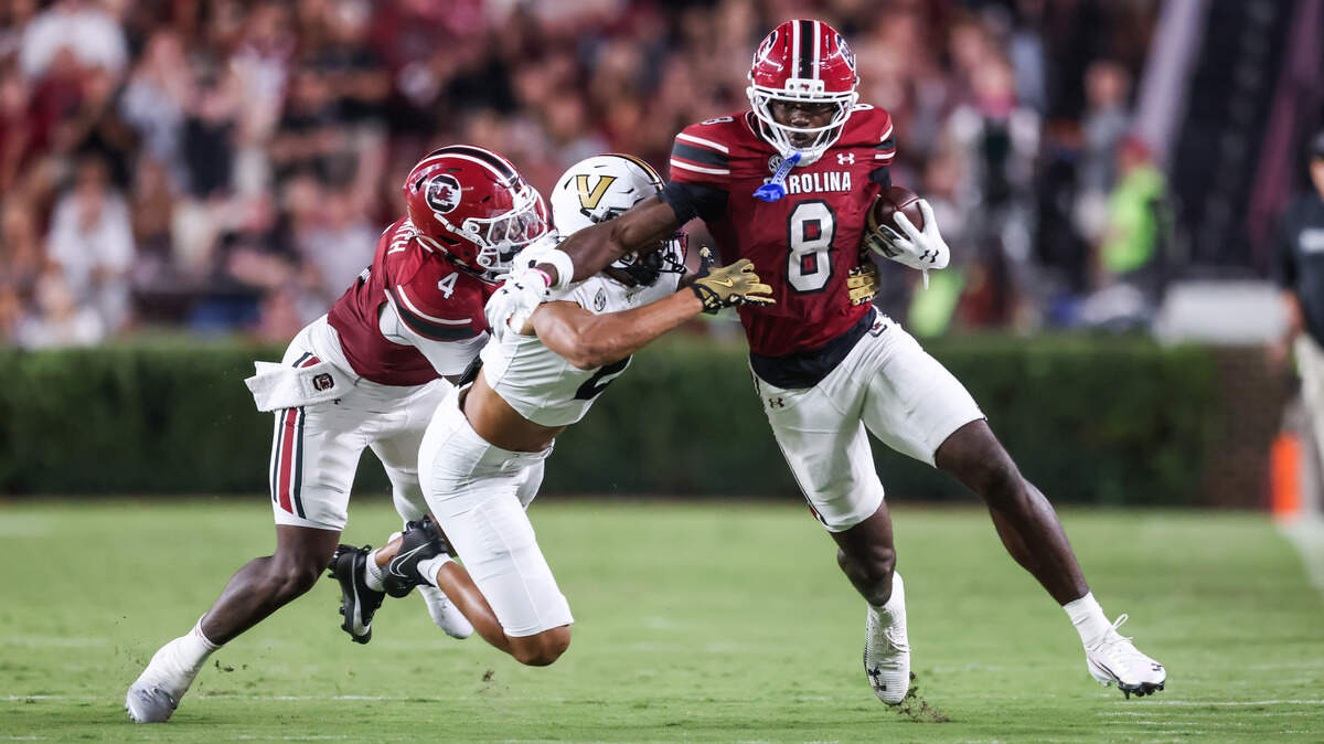 South Carolina wide receiver Nyck Harbor (8) fends off the tackle of Vanderbilt linebacker Randon Fontenette (2) during the first half of the Gamecocks’ game against Vanderbilt at Williams-Brice Stadium in Columbia on Saturday, September 13, 2025.
