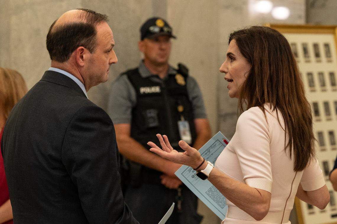 U.S. Rep. Nancy Mace, R-Daniel Island, speaks with Attorney General Alan Wilson after a ceremonial bill signing in the lobby of the State House on Thursday, Aug. 15, 2024.