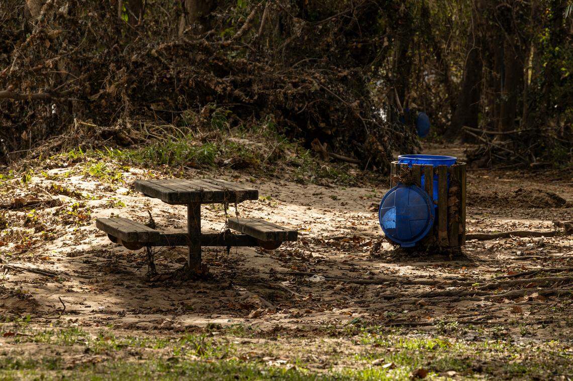 A layer of mud, washed up from the Congaree River, covers the Cayce Riverwalk where the Congaree River over topped its banks. Heavy rains upstream from Hurricane Helene caused the river to crest at 30.58 feet.