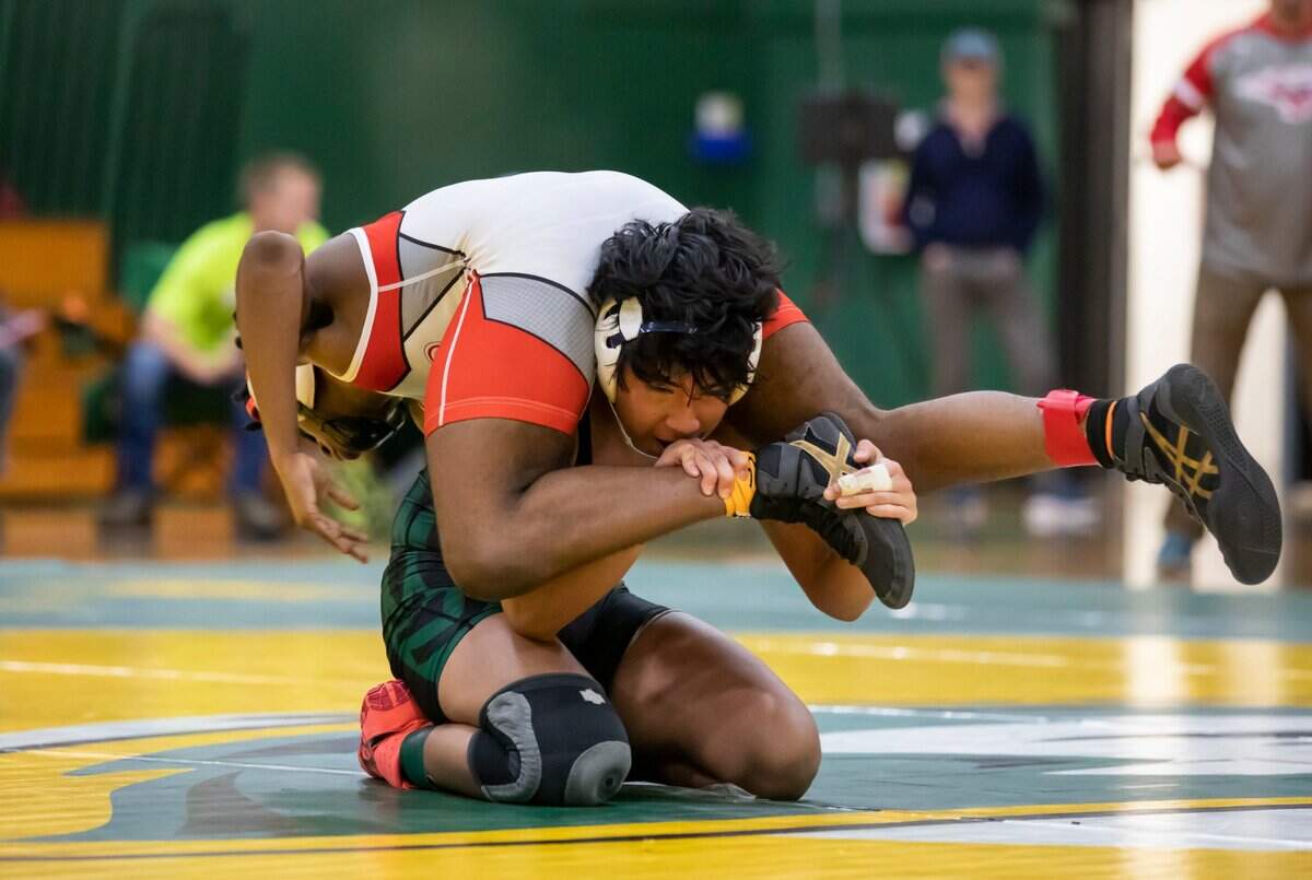 Tanner Carson of Ben Lippen lifts Josh Prioleau of the Hammond School during the SCISA 2022 Duals State Wrestling Tournament at Ben Lippen on Saturday, February 5, 2022.