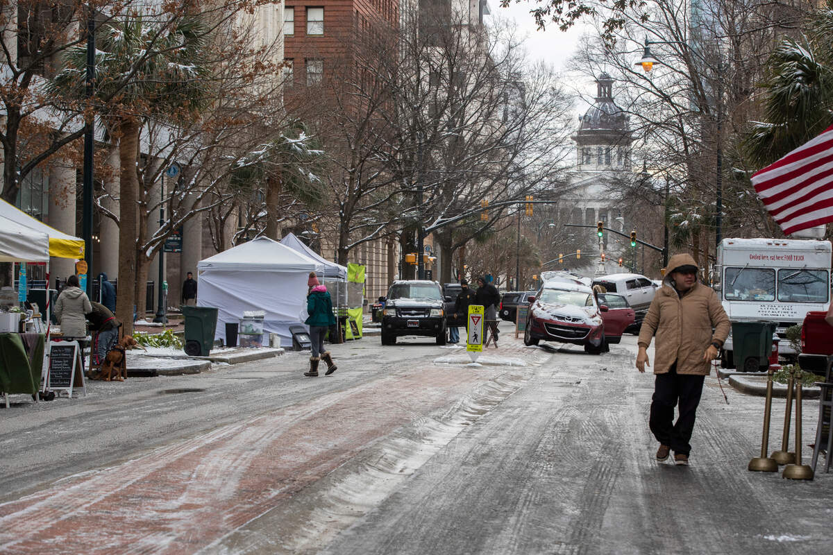 Snow blankets Columbia, South Carolina on Saturday, January 21, 2022. Soda City Market, which is typically two blocks long during the winter, only took up one city block Saturday.