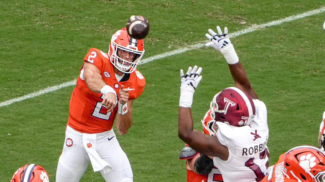 Clemson quarterback Cade Klubnik (2) passes near Troy Trojans defense during the first quarter at Memorial Stadium in Clemson, S.C. Saturday, September 6, 2025.