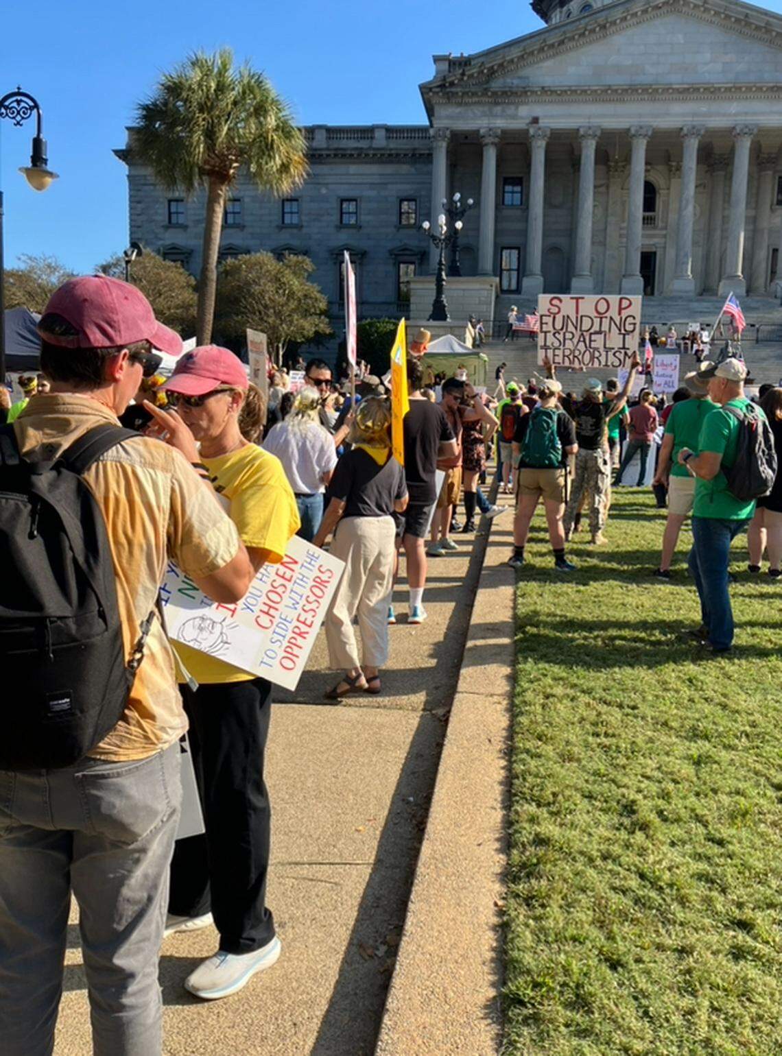 Throngs of protesters descended on the state capitol grounds Saturday Oct. 18 to protest Gov. Donald Trump at a “No Kings’ rally. The rally was one of many held around the country.