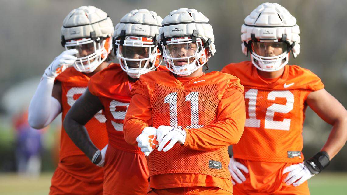 Clemson football defensive linemen Peter Woods (11) and T.J. Parker (12) during the Tigers’ opening day of spring practice at the Allen N. Reeves Football Complex on March 6, 2023.