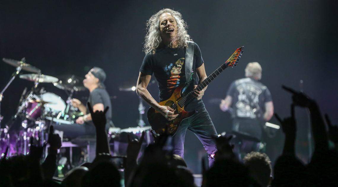 Guitarist Kirk Hammett of the band Metallica plays for a record crowd of 15,690 at Intrust Bank Arena on Monday night.