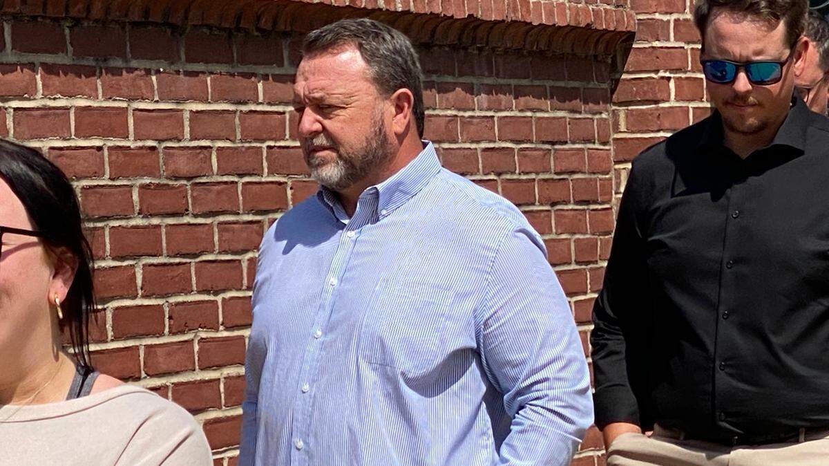 William Taylor (center) pleaded not guilty on Wednesday, April 30, 2025, to hacking into a chemical cleaning system for chicken processing plants and changing the dosage.