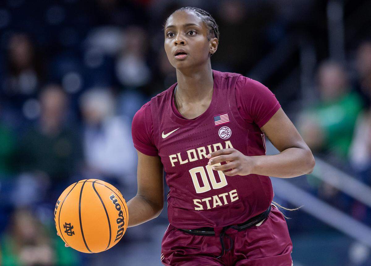 SOUTH BEND, IN - JANUARY 26: Ta'Niya Latson #0 of the Florida State Seminoles brings the ball up court during the game against the Notre Dame Fighting Irish at Joyce Center on January 26, 2023 in South Bend, Indiana.