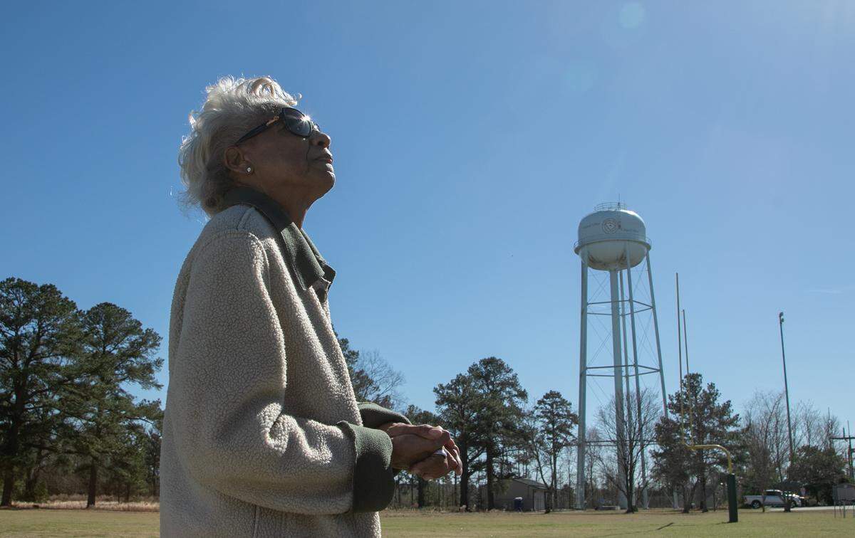 Karen Irick successfully spearheaded a 2005 effort to get clean water to her neighborhood in Hopkins, SC. Here, she stands near the regional water system that now supplies her community. 2/25/19