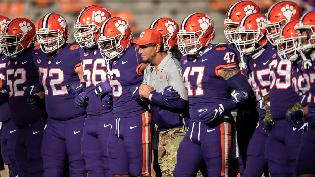 Clemson head coach Dabo Swinney does the pregame walk of champions