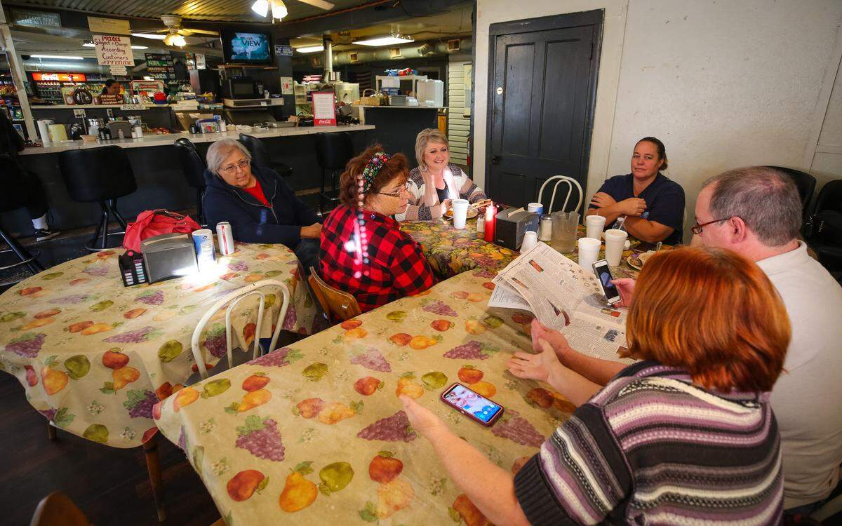 Jada Garris, (top center) has breakfast with former coworkers at Tha Store in Gilbert. All are school bus drivers, except for Garris, who was elected to the Lexington 1 school board on Nov. 6. She must now figure out how to balance her outspoken advocacy and her role as a freshman on the board she has long disagreed with. 12/4/18