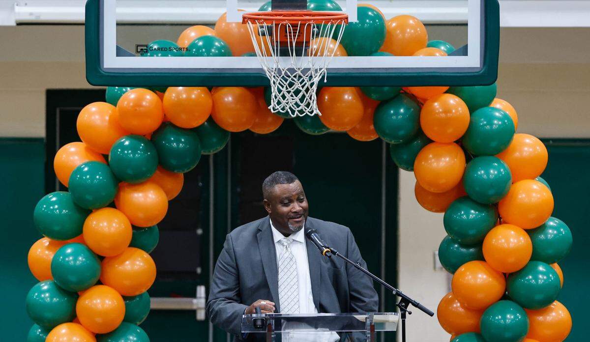 George Glymph’s son, the Rev. Michael D. Glymph, shares about his father during funeral services for Coach Glymph at Eau Claire High School on Dec. 22.