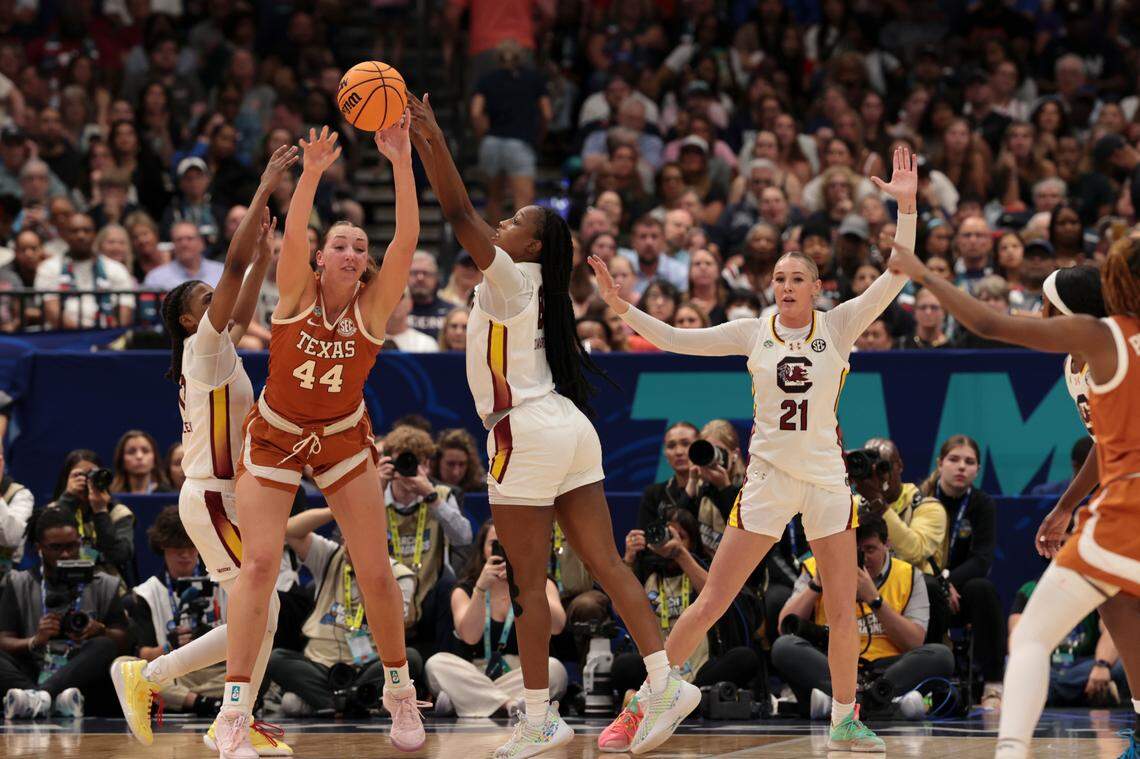 University of South Carolina’s Joyce Edwards (8) and University of South Carolina’s MiLaysia Fulwiley (12) block Texas’ Taylor Jones (44) during the first half of action at Amalie Arena in Tampa, Fla. on Friday, April 4, 2025.