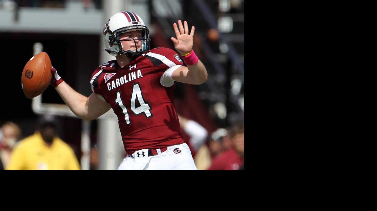 South Carolina Gamecocks quarterback Connor Shaw (14) delivers a pass in the first quarter of the Gamecocks game against Kentucky at Williams-Brice Stadium, Saturday, October 8, 2011.