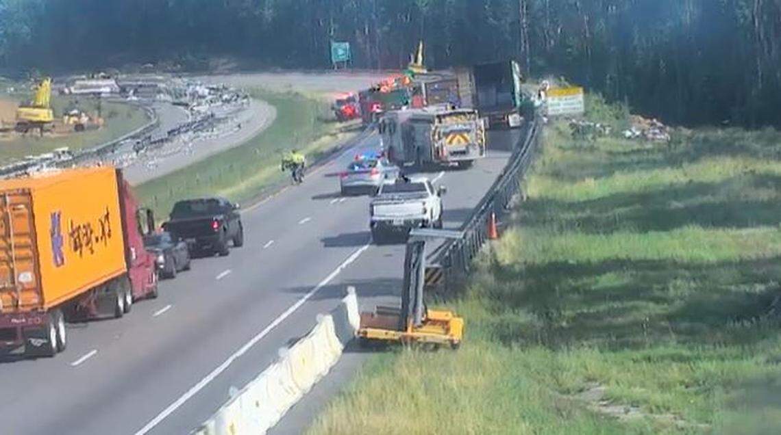 Emergency crews respond to a vehicle fire on I-26.