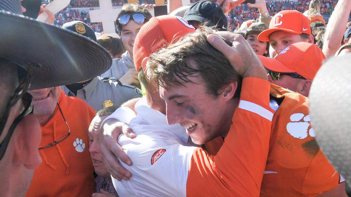 Nov 4, 2023; Clemson, South Carolina, USA; Clemson Tigers head coach Dabo Swinney hugs quarterback Cade Klubnik (2) after defeating the Notre Dame Fighting Irish at Memorial Stadium. Mandatory Credit: Ken Ruinard-USA TODAY Sports