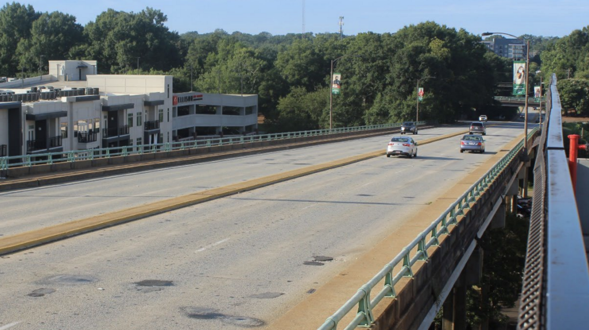 Beginning next year, the four-lane bridge over East Broad Street that was designed to let travelers avoid downtown streets will be reduced to two lanes and the walkway will be closed.