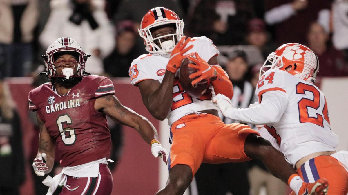 Clemson’s Andrew Booth Jr. (23) intercepts the ball intended for South Carolina Gamecocks wide receiver Josh Vann (6) at Williams-Brice Stadium on Saturday, November 27, 2021.
