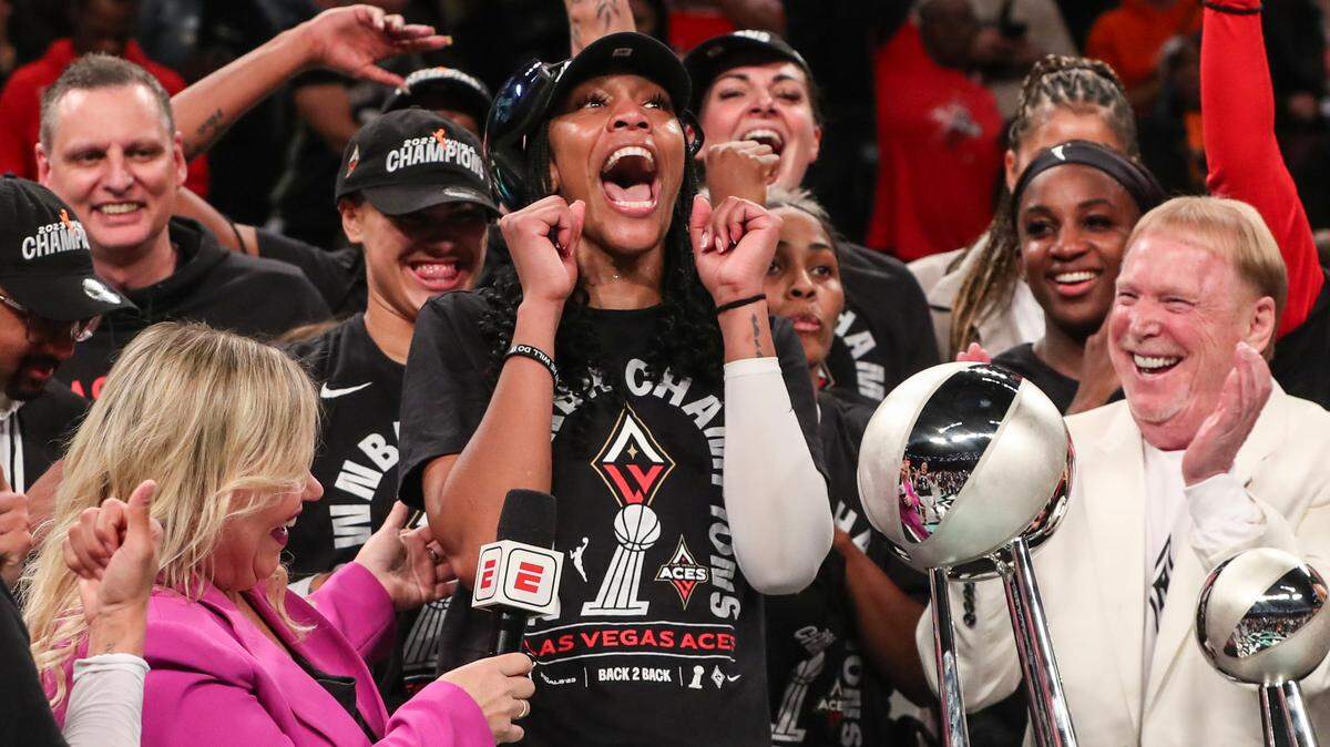 Oct 18, 2023; Brooklyn, New York, USA; Las Vegas Aces forward A’ja Wilson (22) and owner Mark Davis celebrate after winning the 2023 WNBA Finals at Barclays Center. Mandatory Credit: Wendell Cruz-USA TODAY Sports