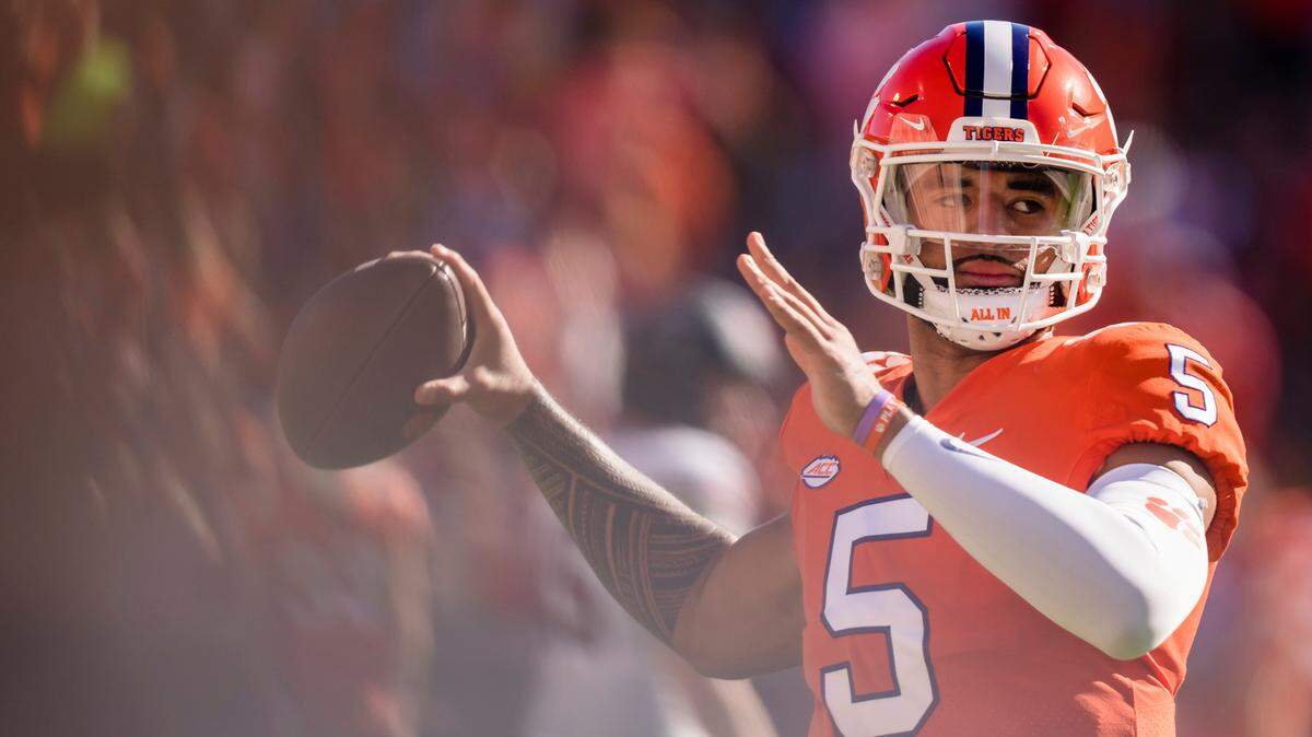 Clemson quarterback DJ Uiagalelei (5) warms up before an NCAA college football game against South Carolina on Saturday, Nov. 26, 2022, in Clemson, S.C. (AP Photo/Jacob Kupferman)