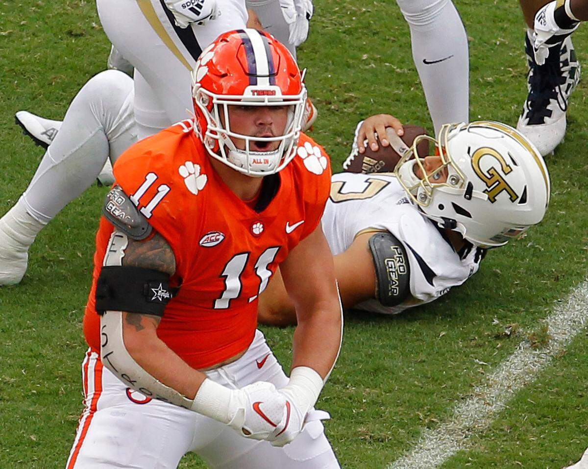 Clemson defensive lineman Bryan Bresee (11) celebrates after making a big hit against Georgia Tech in Clemson, S.C. on Saturday, Sept. 18, 2021.