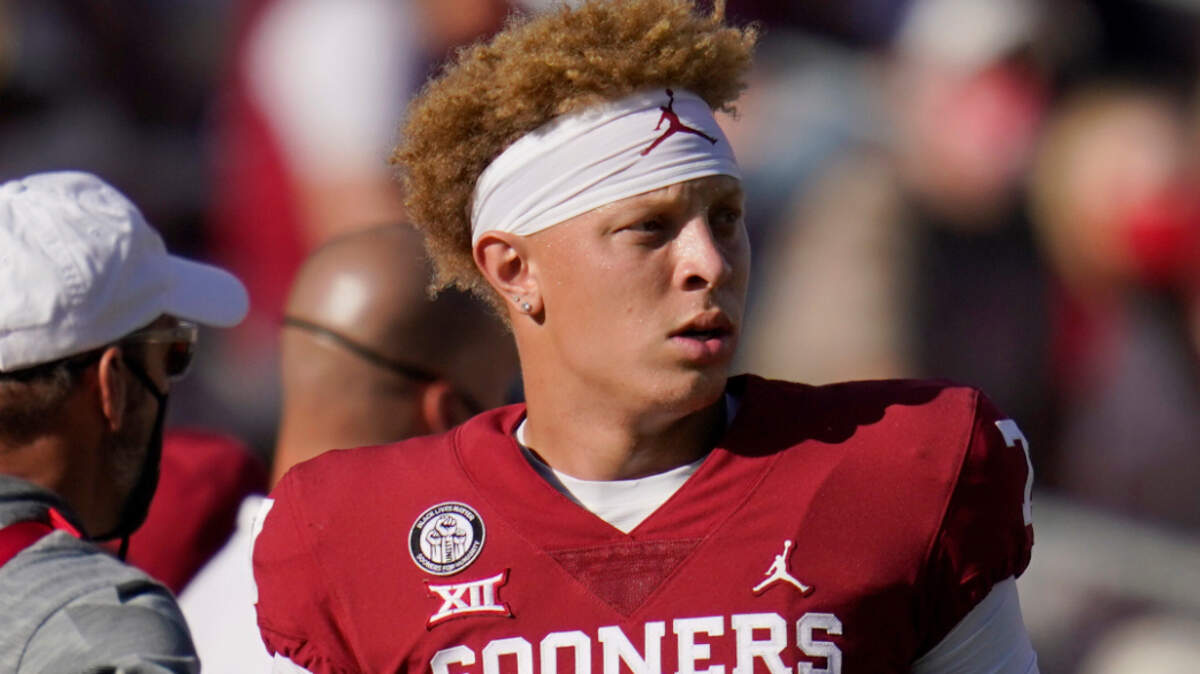 Oklahoma quarterback Spencer Rattler (7) walks on the sidelines during an NCAA college football game against Kansas in Norman, Okla., Saturday, Nov. 7, 2020. (AP Photo/Sue Ogrocki)