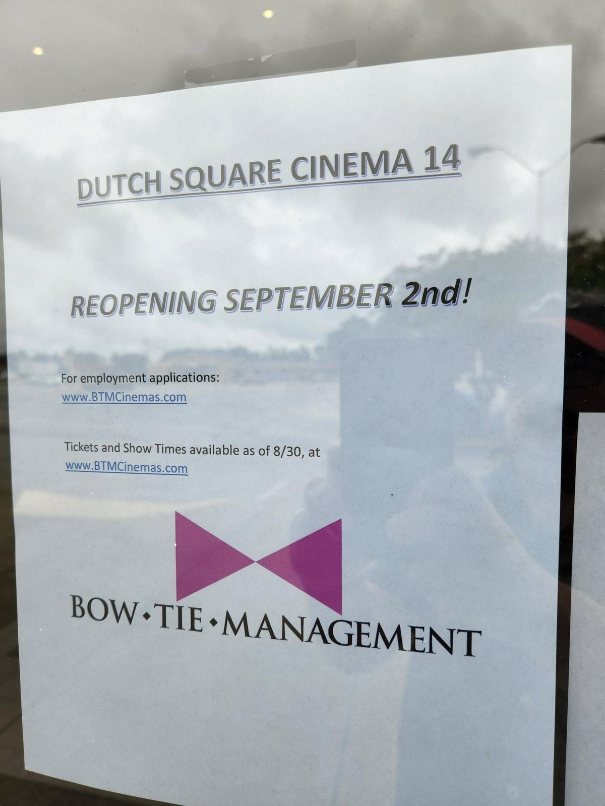 A sign at the AMC Dutch Square 14 cinema, which recently closed, indicates it will be reopened in September by a different company, Bow Tie Management.