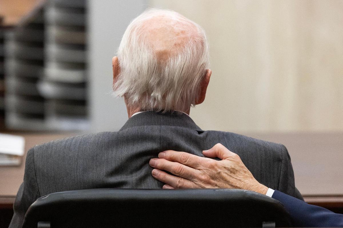 Attorney Rauch Wise comforts Richard Quinn Sr. as Judge Carmen Mullen accepts negotiated guilty plea on Wednesday, April 19, 2023. Quinn plead guilty to perjury and obstruction of justice and will serve his sentence at home.