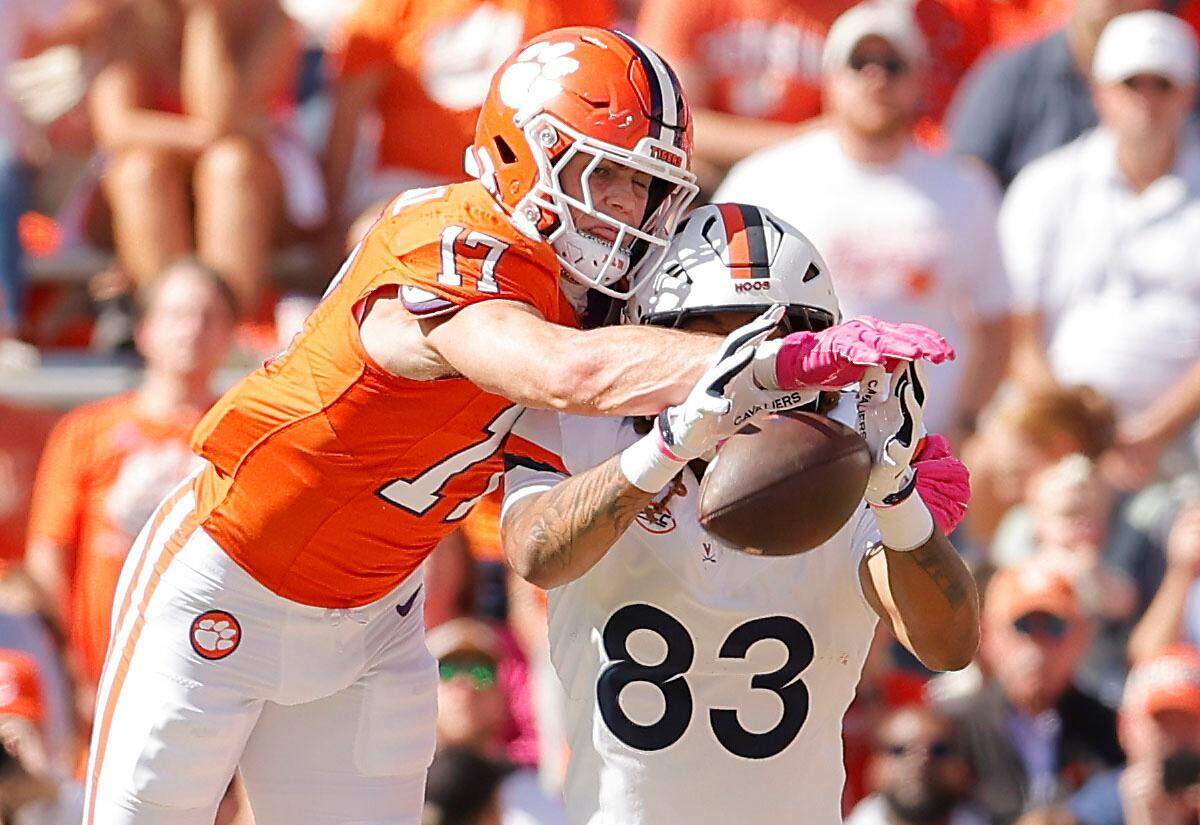 Clemson linebacker Wade Woodaz (17) breaks up a pass intended for Virginia tight end Dakota Twitty (83) during first-half action in Clemson, S.C. on Saturday, Oct. 19, 2024.