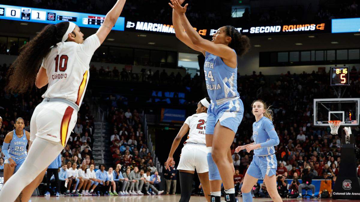 North Carolina’s Indya Nivar (24) shoots as South Carolina’s Kamilla Cardoso (10) pressers during the first half of action in the second round of the NCAA Tournament at the Colonial Life Arena in Columbia, SC, on Sunday, March. 24, 2024.