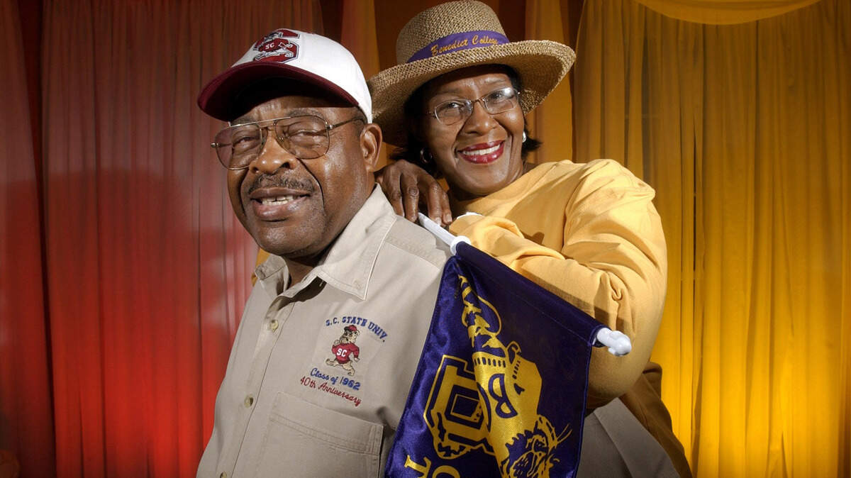 For Harold White and his wife, Mozella, have a house divided this week. He graduated from SC State and she is an alumnus of Benedict. They will be at the Palmetto Capital City Classic this weekend, cheering for their alma maters. PHOTO BY TIM DOMINICK 09/23/2003